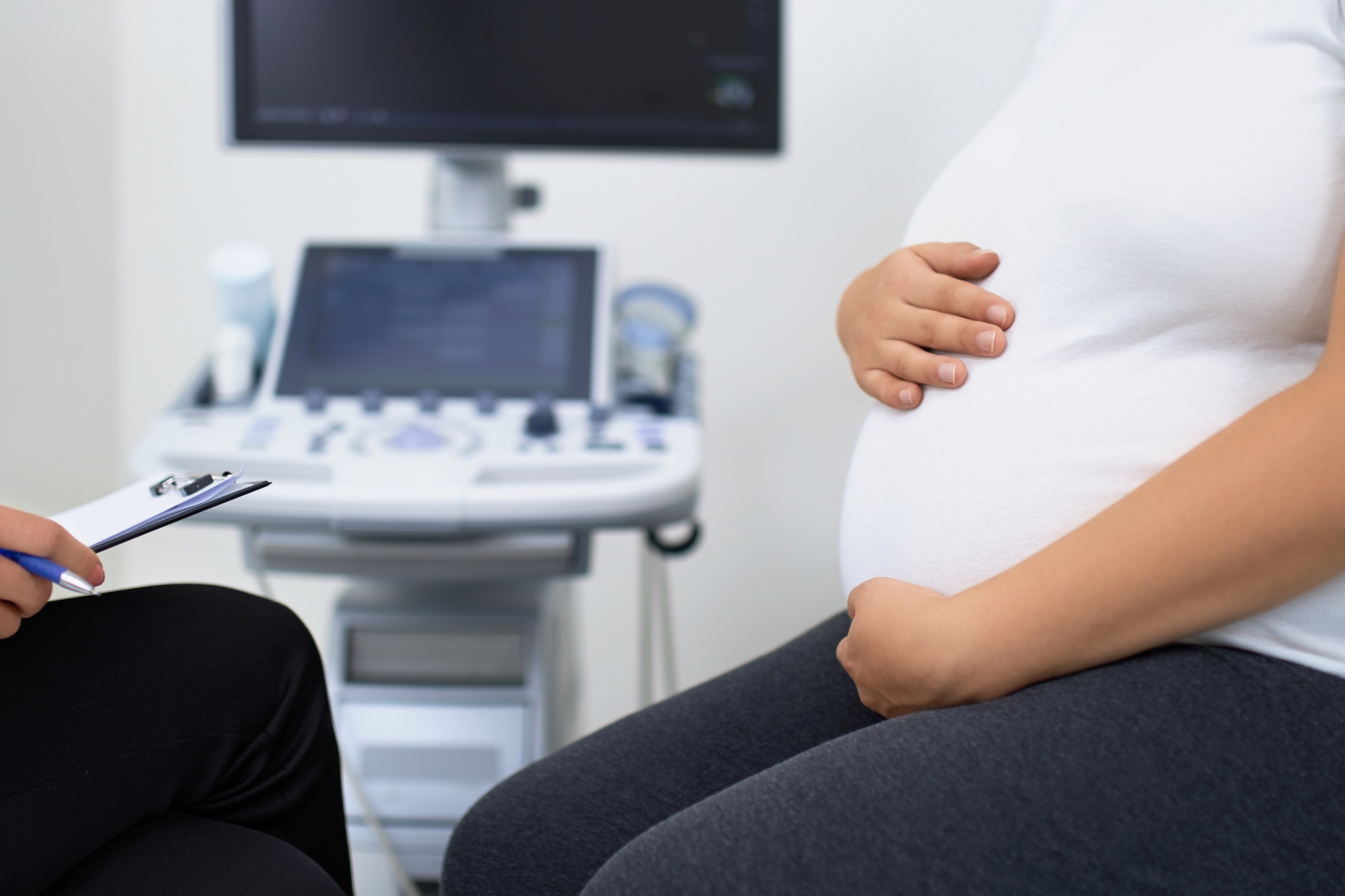 Close up of pregnant woman having medical checkup